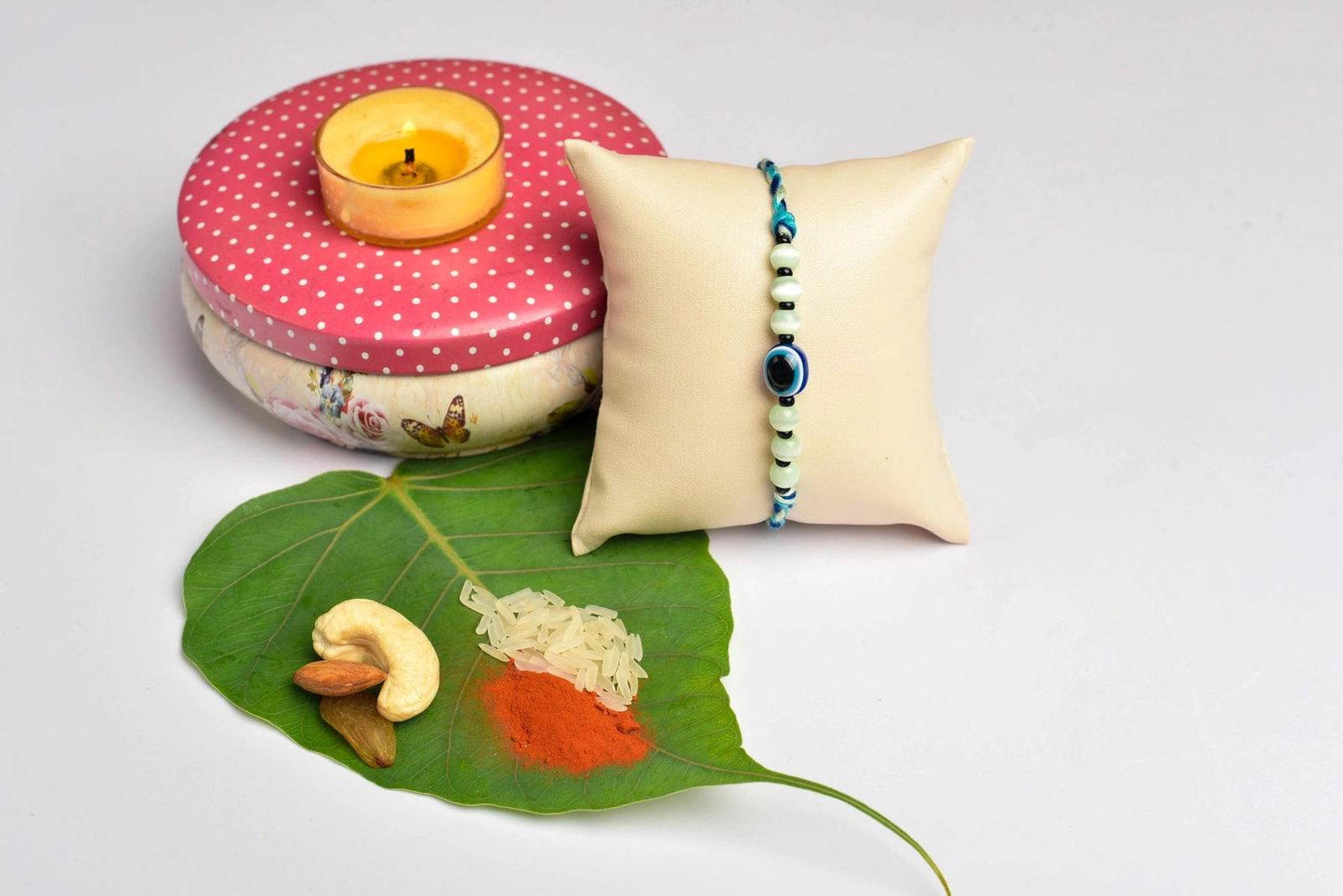 Green Blue Onyx Cat's Eye Evil Eye Rakhi With Roli Chawal for Raksha Bandhan Celebration - Lookandadorn.com