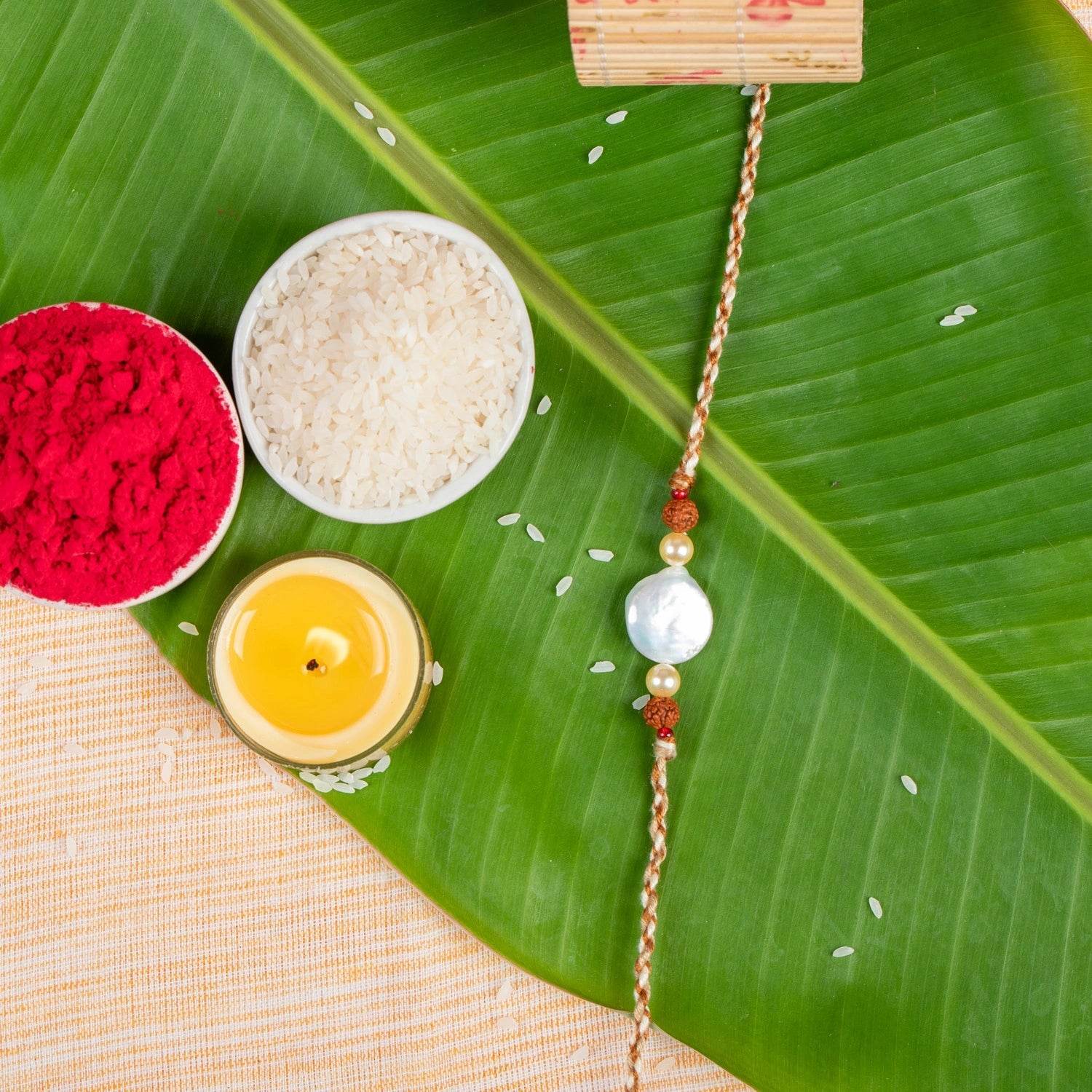 Handmade Coin Pearl Rudraksh Rakhi with Roli and Chawal - Unique Designer Gift for Brother - Lookandadorn.com