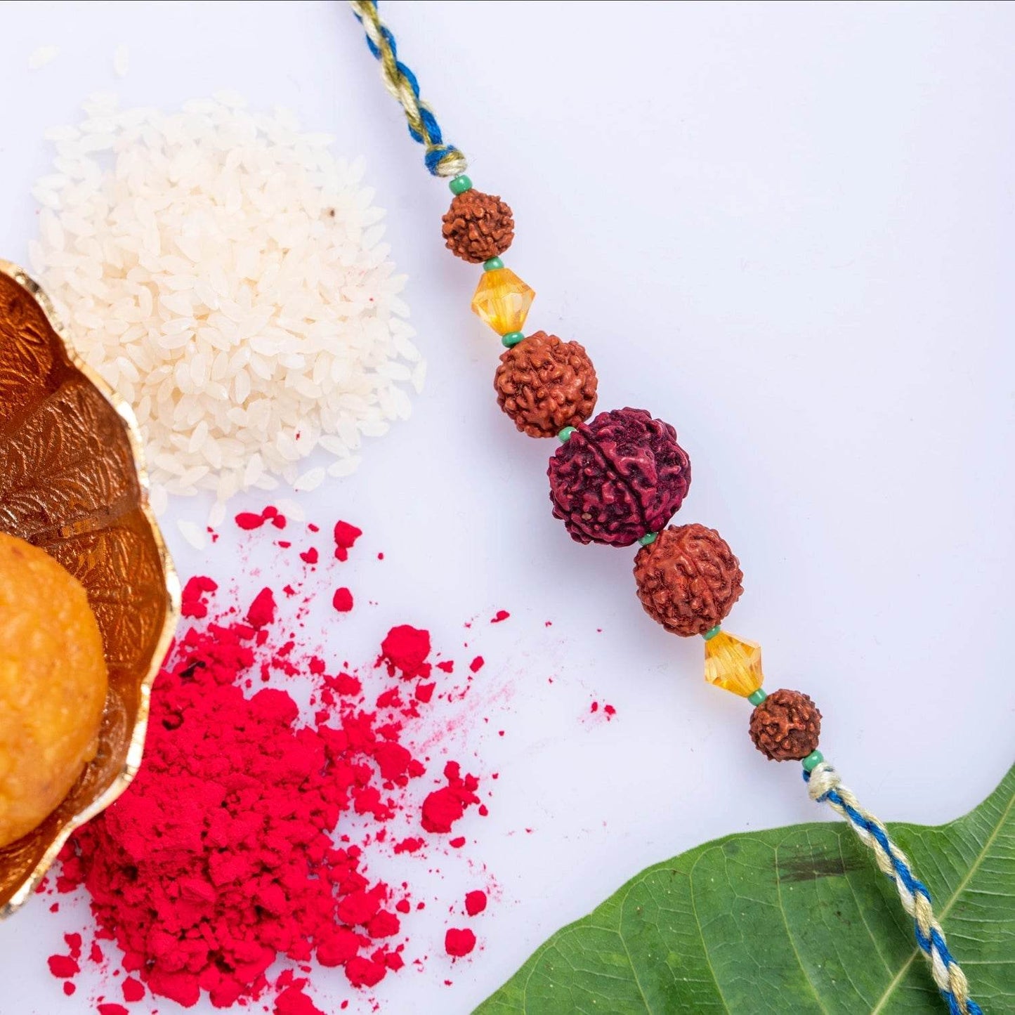 Handmade Colorful Rudraksh Designer Rakhi with Roli & Chawal for Brother - Traditional & Skin-Friendly - Lookandadorn.com