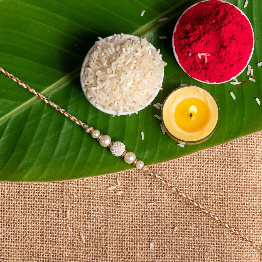 Handmade Designer Beaded Pearl Rakhi with Roli and Chawal for Brother - Traditional Love Token - Lookandadorn.com