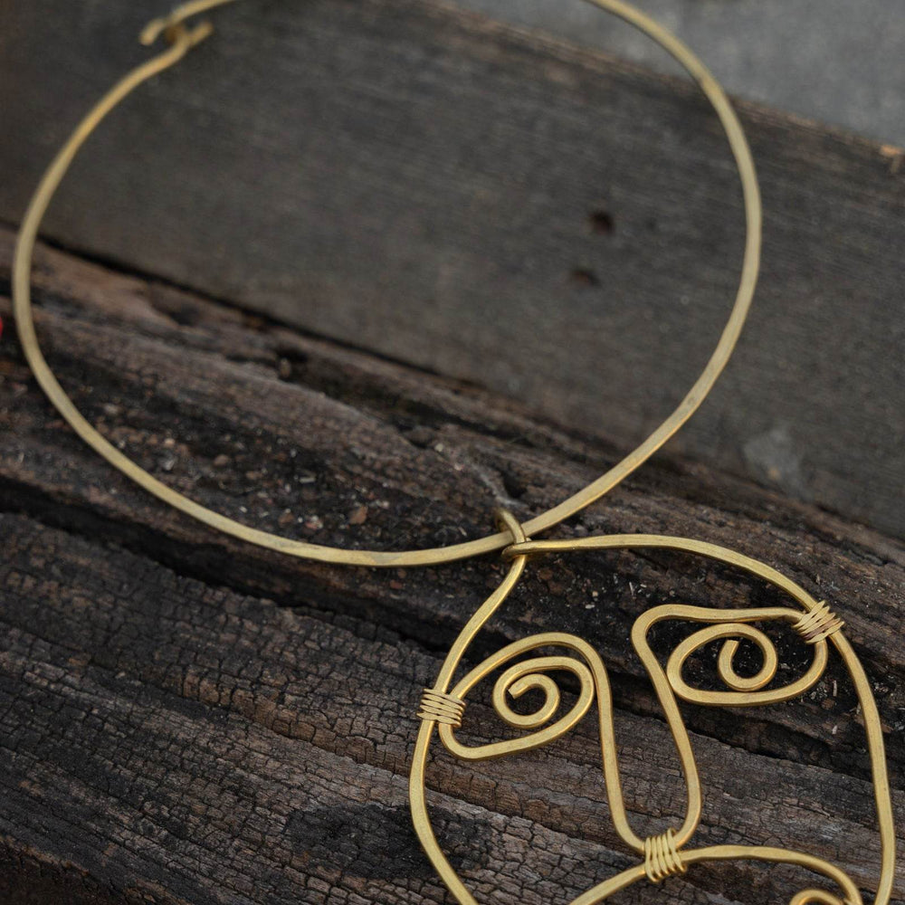 Handmade Dokra Brass Abstract Face Spiral Necklace - Unique Artistic Statement Jewelry - Lookandadorn.com