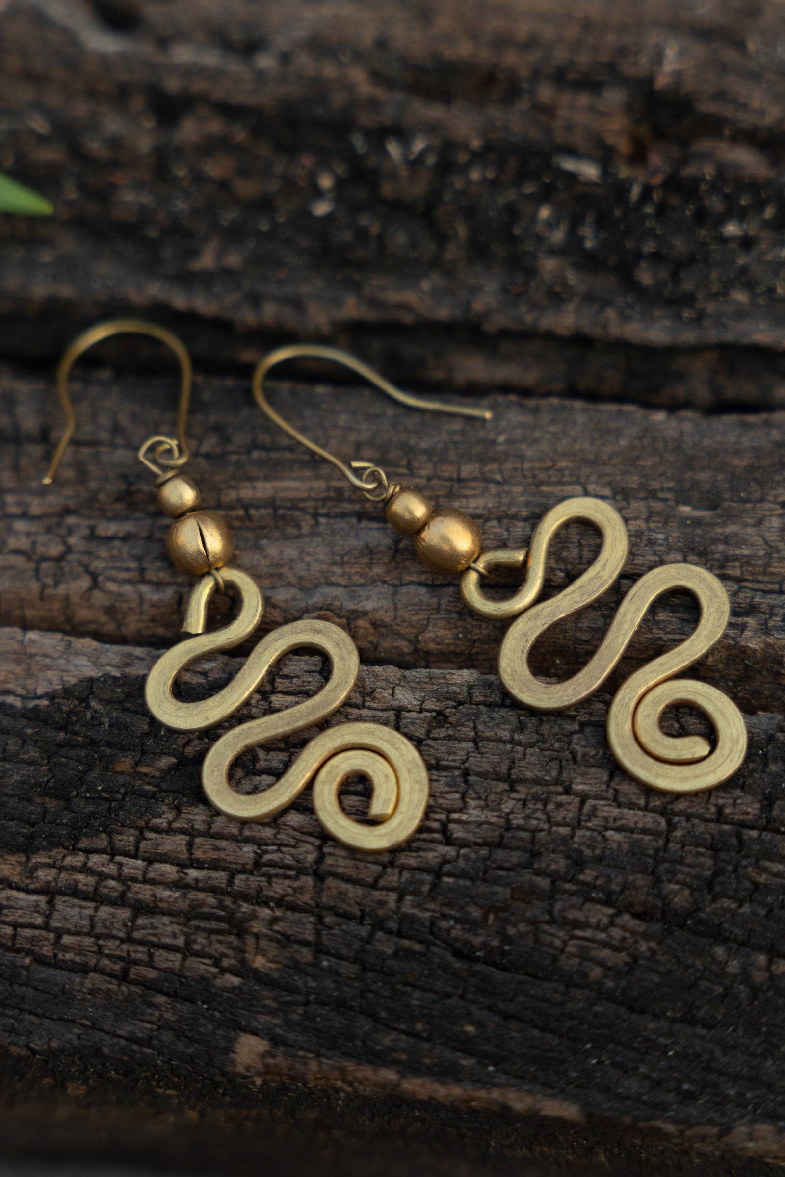 Handmade Dokra Brass Snake Spiral Earrings – Unique Artisan Design for Elegant Style - Lookandadorn.com