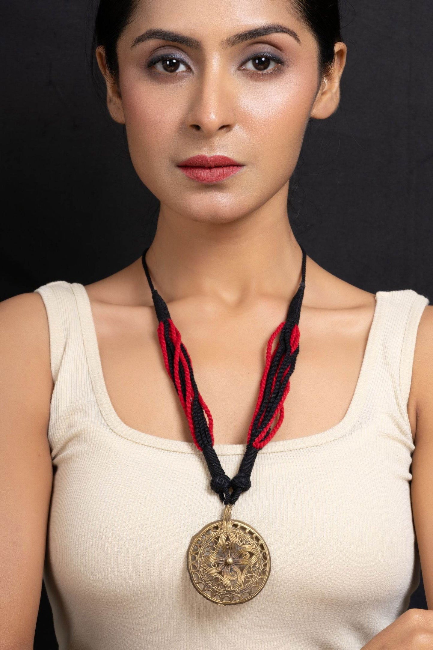 Handcrafted Golden Floral Dokra Pendant Necklace with Adjustable Red Black Dori for Women - Lookandadorn.com