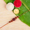 Handmade Pancha Rudraksh Designer Rakhi Set with Roli and Chawal for Raksha Bandhan Celebration - Lookandadorn.com