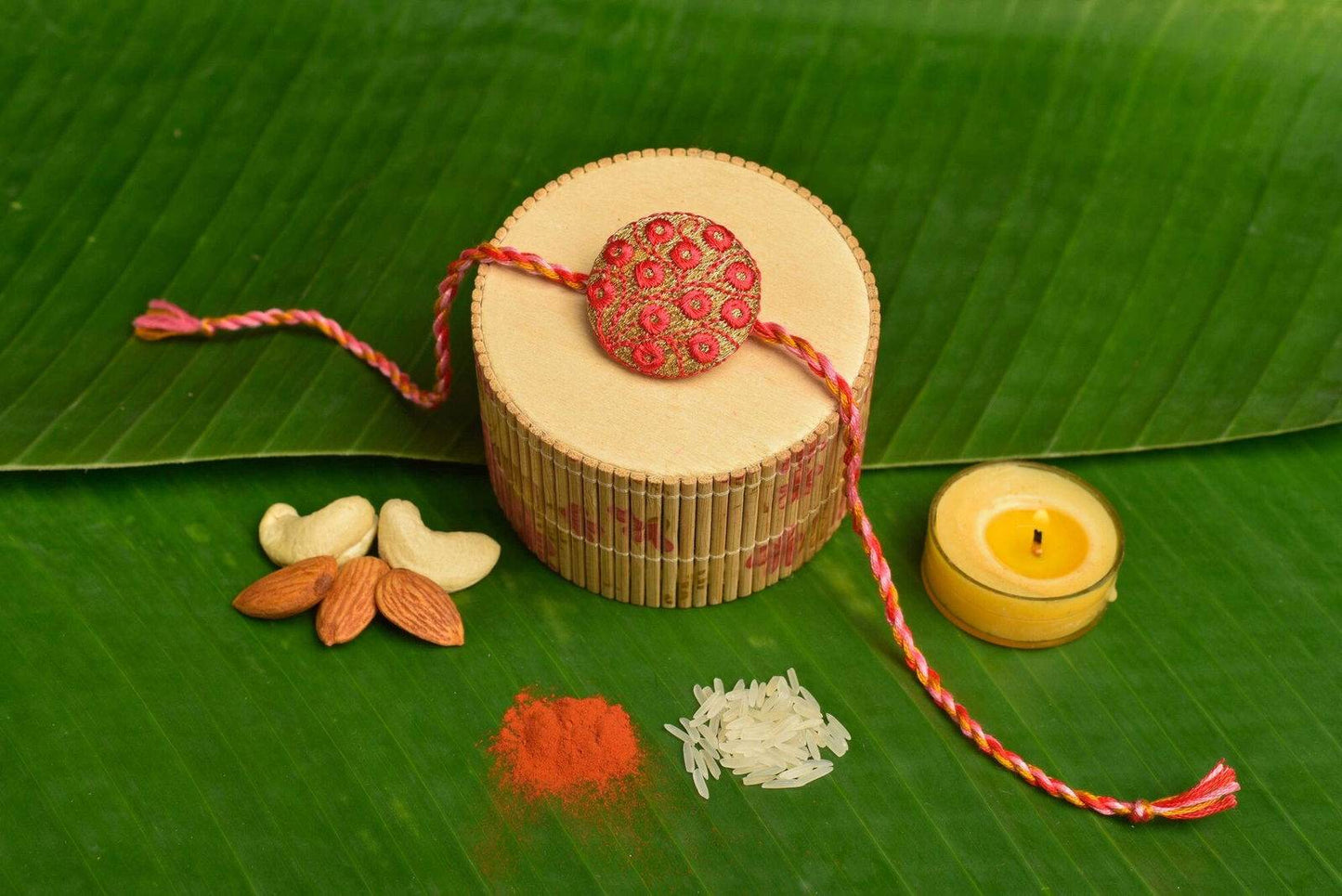 Handmade Peach Golden Embroidery Designer Rakhi With Roli And Chawal for Brothers - Lookandadorn.com