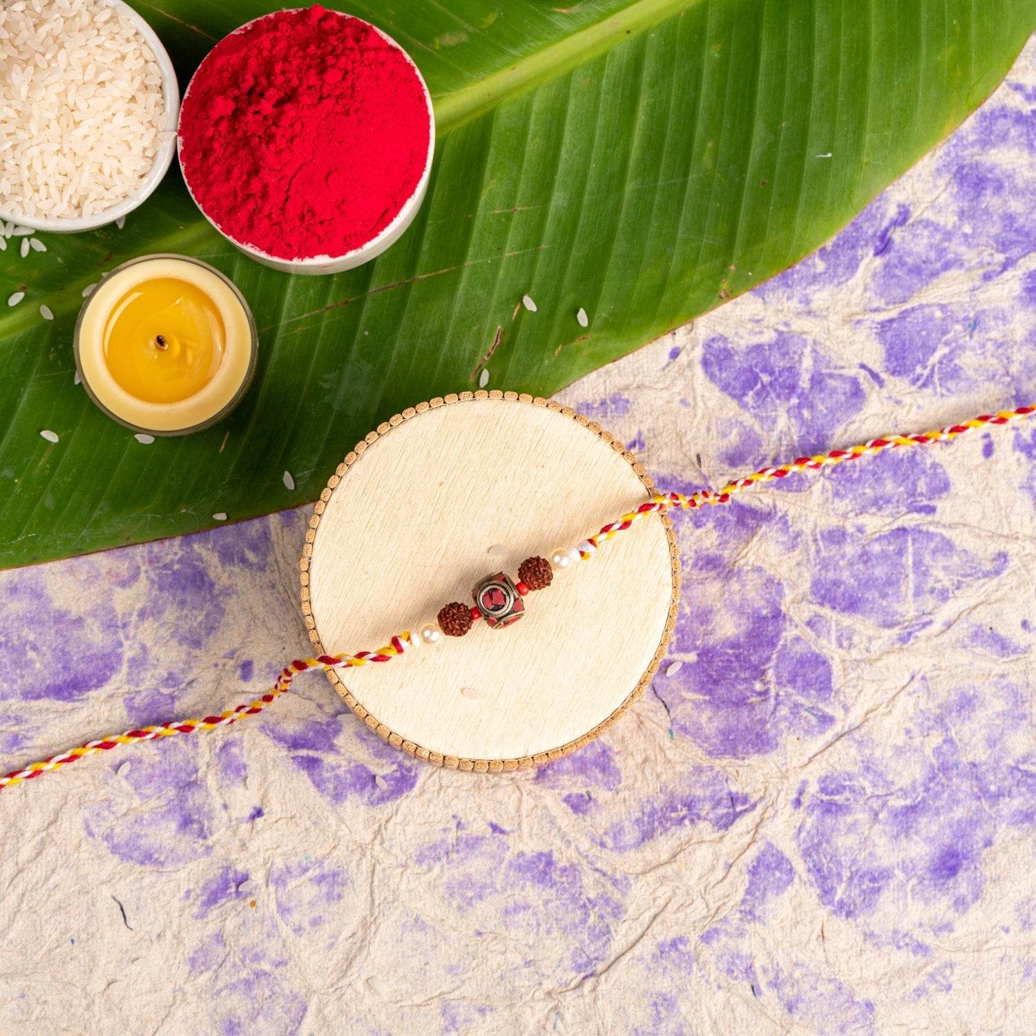 Red Tibetan Rudraksh Designer Rakhi Gift Set with Roli Chawal for Raksha Bandhan Celebration - Lookandadorn.com