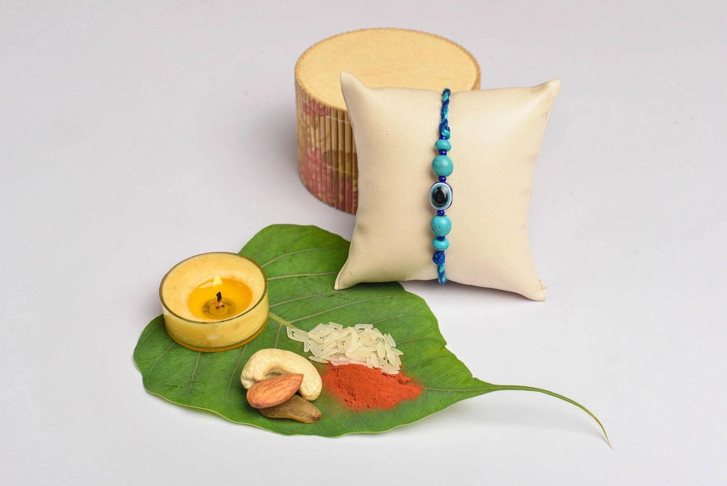 Turquoise Blue Onyx Evil Eye Rakhi With Roli & Chawal - Handmade Designer Rakhi For Brothers - Lookandadorn.com