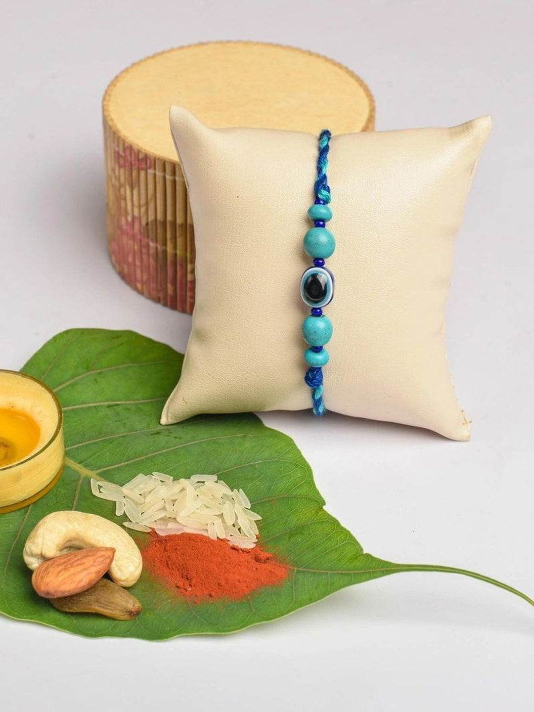 Turquoise Blue Onyx Evil Eye Rakhi With Roli & Chawal - Handmade Designer Rakhi For Brothers - Lookandadorn.com