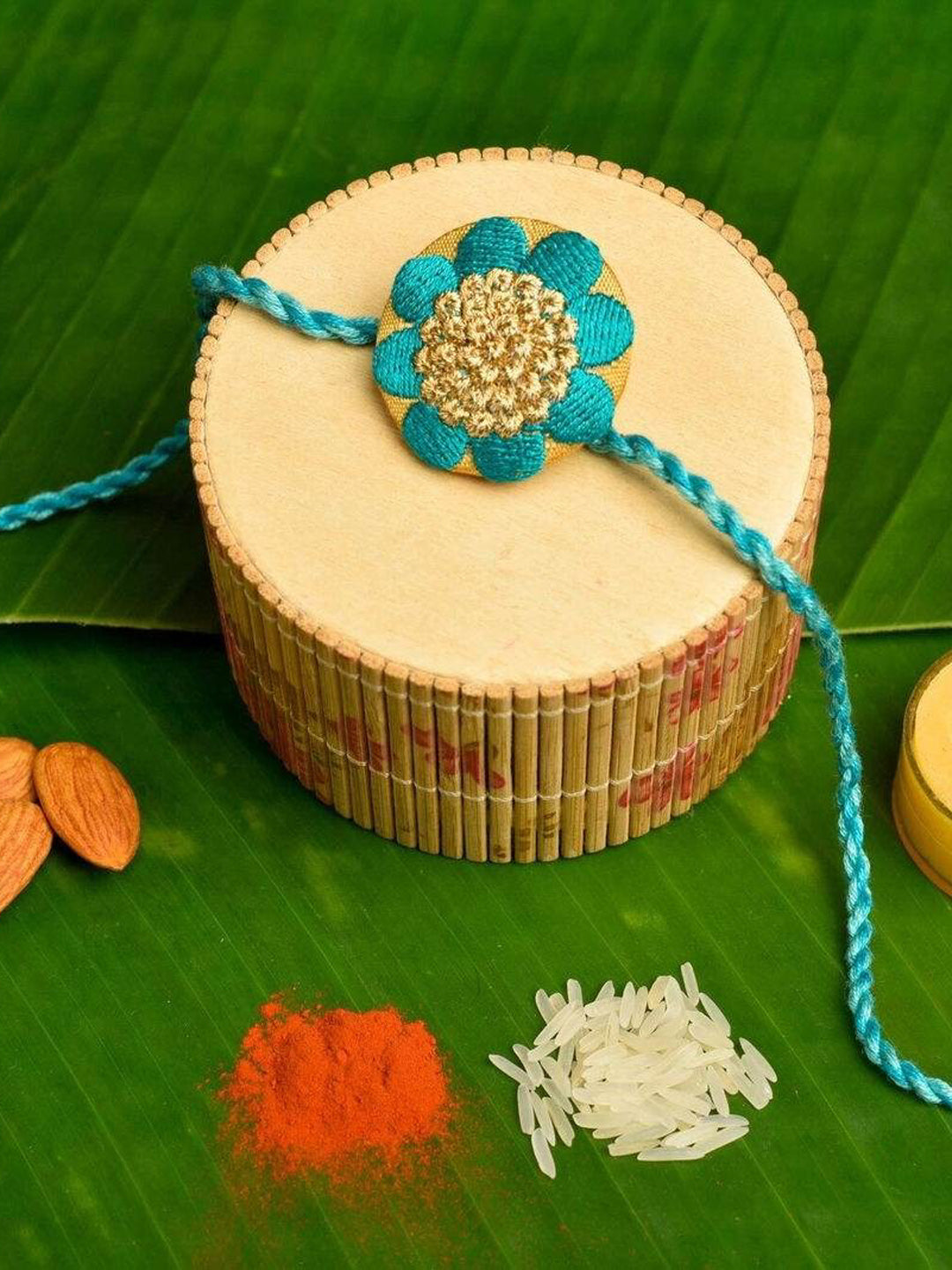 Handmade Turquoise Golden Designer Floral Embroidery Rakhi With Roli And Chawal For Brother - Lookandadorn.com
