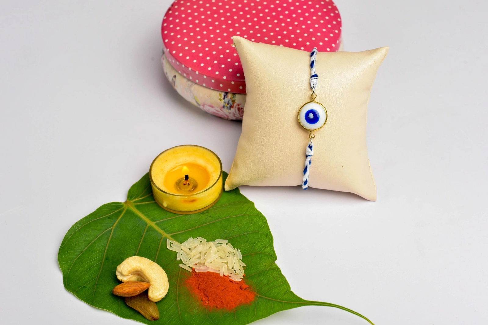 White & Blue Round Onyx Evil Eye Rakhi with Roli & Chawal - Handmade Designer Gift for Brothers - Lookandadorn.com