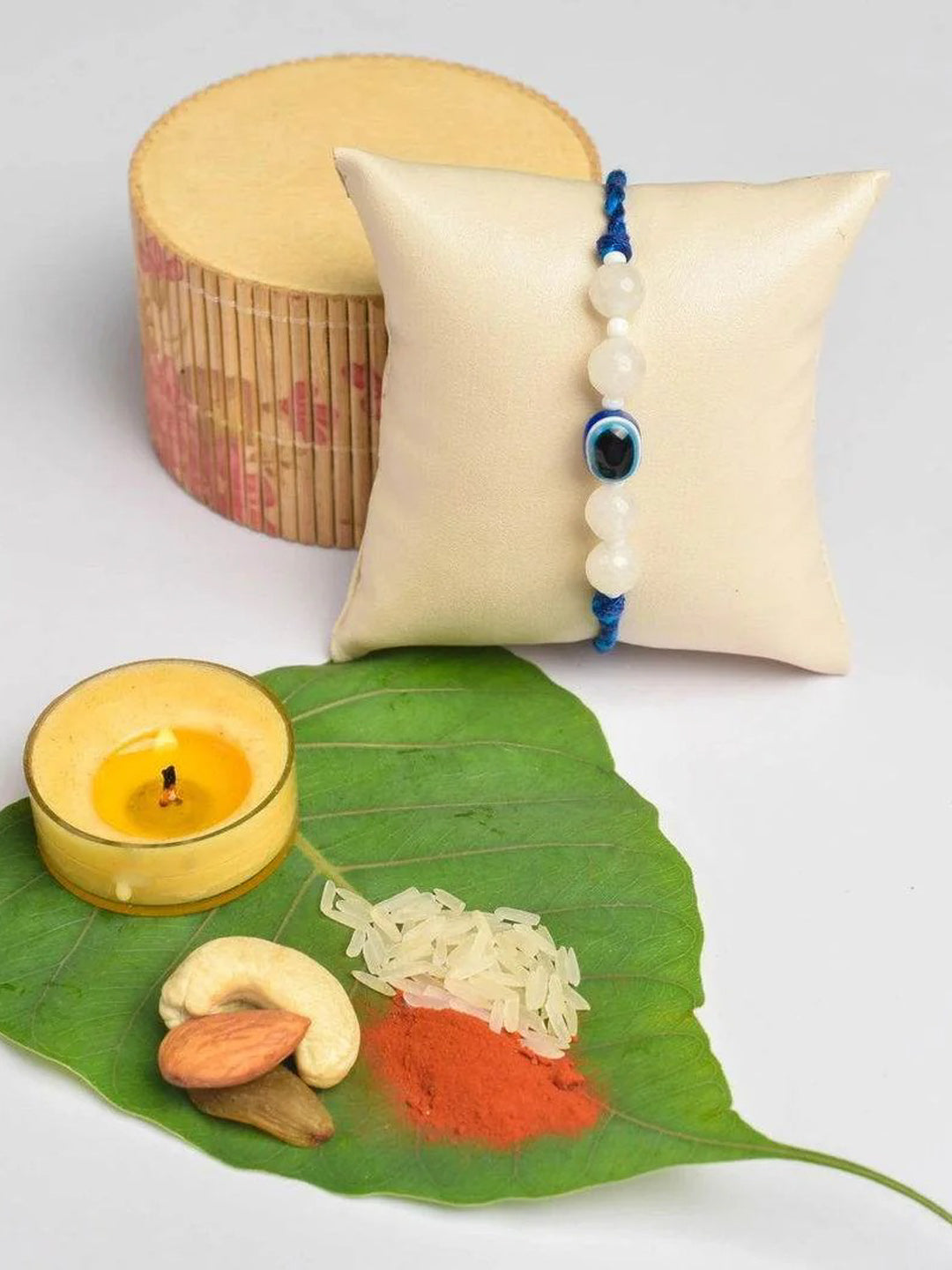 White Onyx and Blue Evil Eye Rakhi Set with Roli and Chawal - Handmade Designer Rakhi for Brothers - Lookandadorn.com