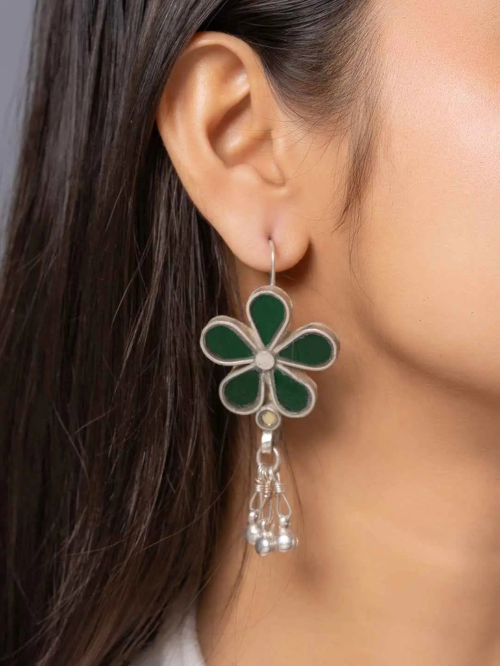 Green and silver Afghani earrings designed as a flower with dangling beads for a unique style