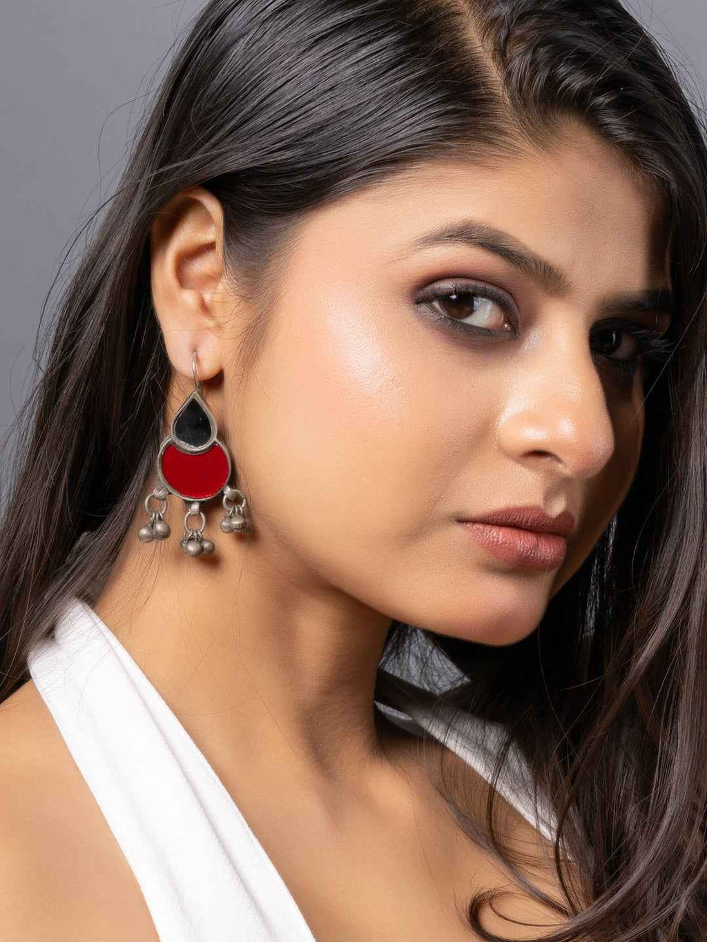 Stylish afghani earrings in red and black with silver jhumka detailing for a chic look