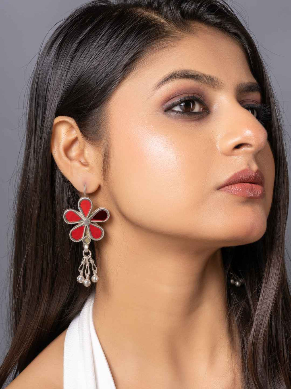 Oxidized silver Afghani earrings with red floral design and pearl accents for a stylish look
