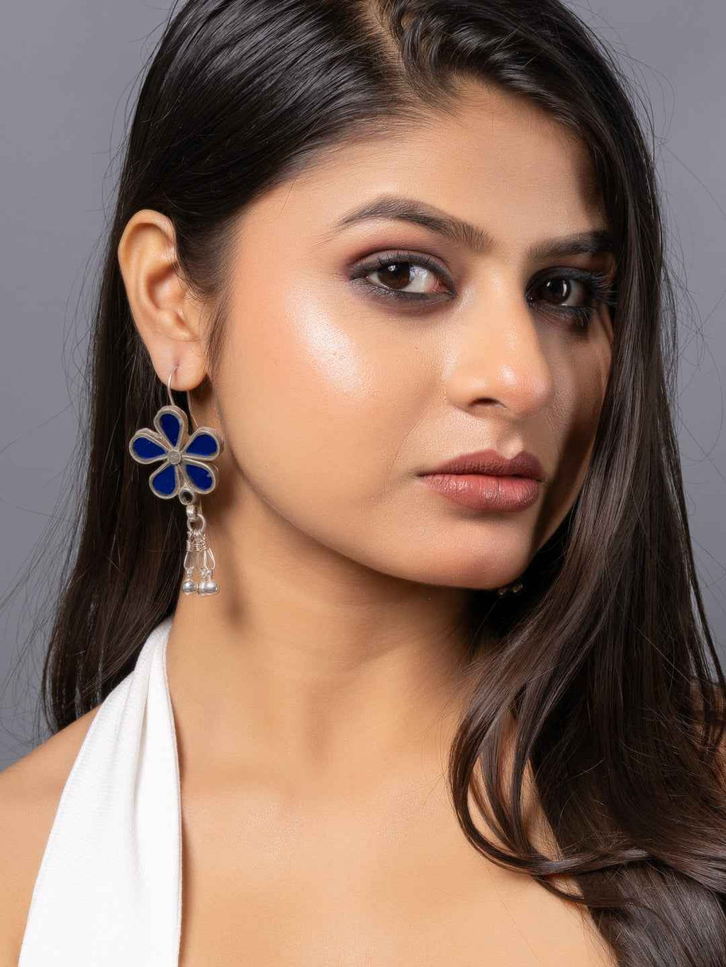 Blue enameled Afghani earrings with floral design and tassel detail for a stunning look