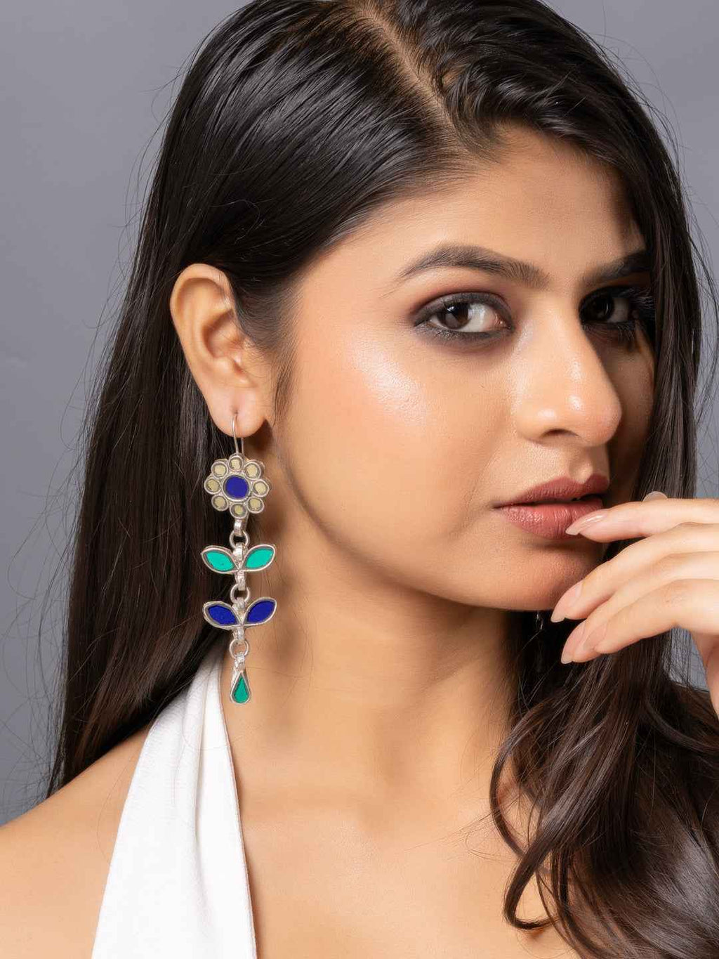 Afghani earrings featuring a floral design with blue and green stones for a traditional look