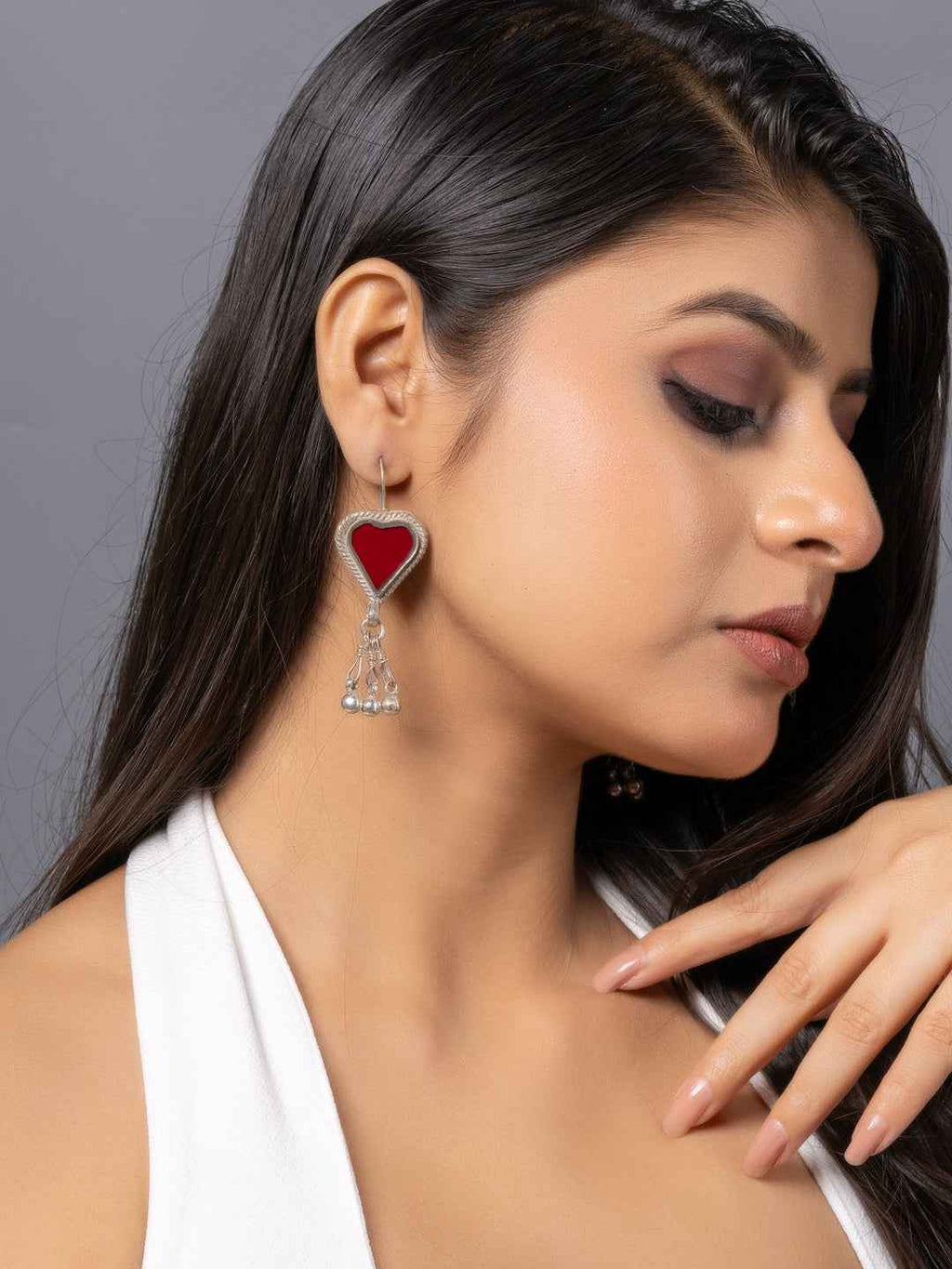 Oxidized Afghani earrings in heart shape with red inlay and dangling pearl accents