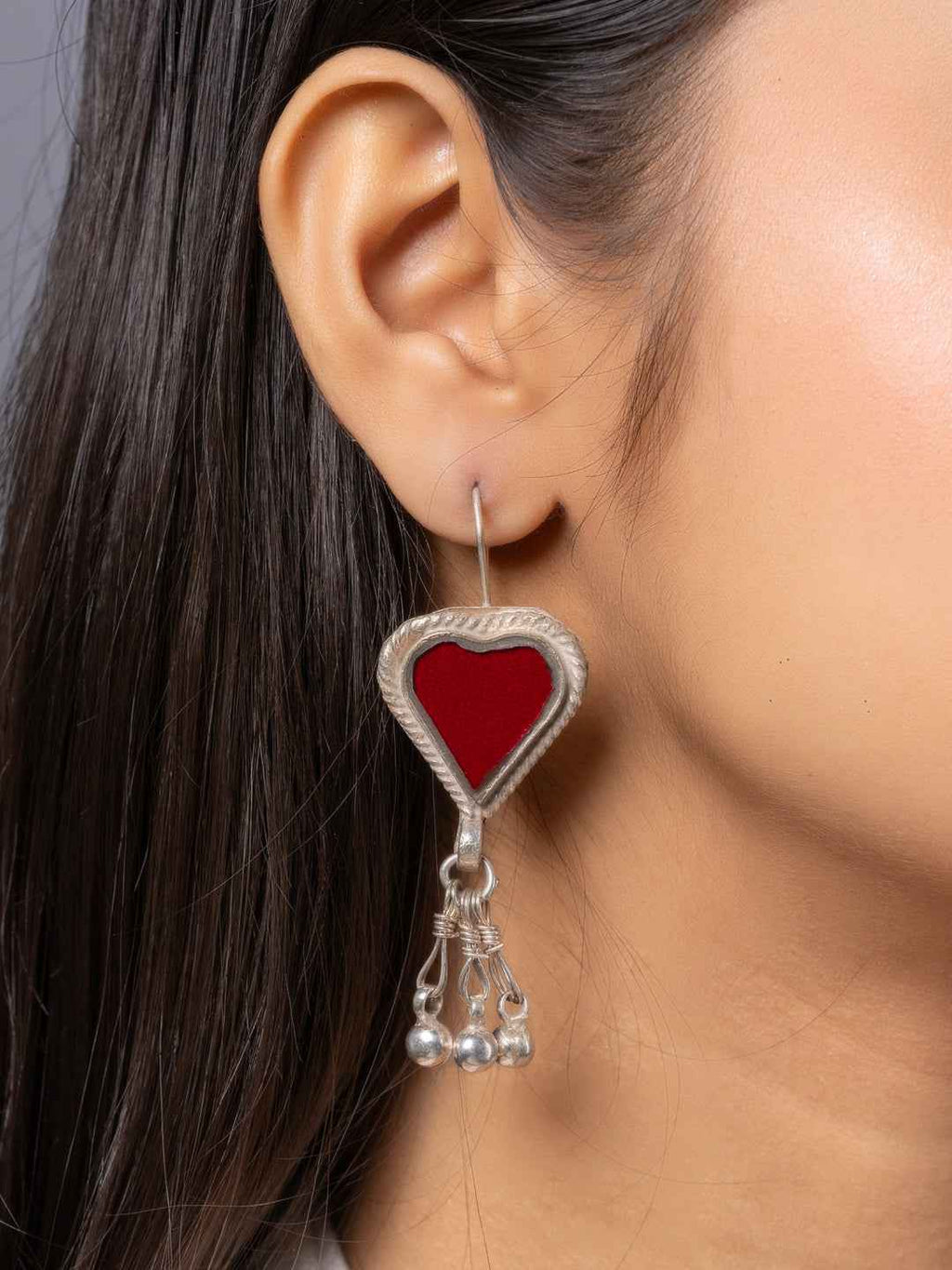Red heart-shaped Afghani earrings with silver detailing and dangling beads