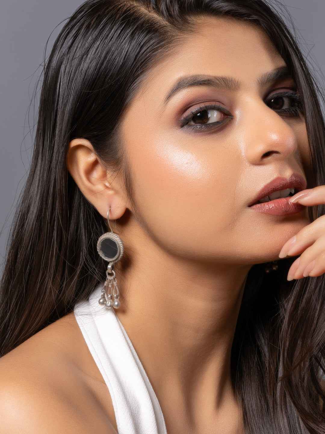 Silver Afghani earrings featuring a round oxidized design with dangling beads for a traditional look