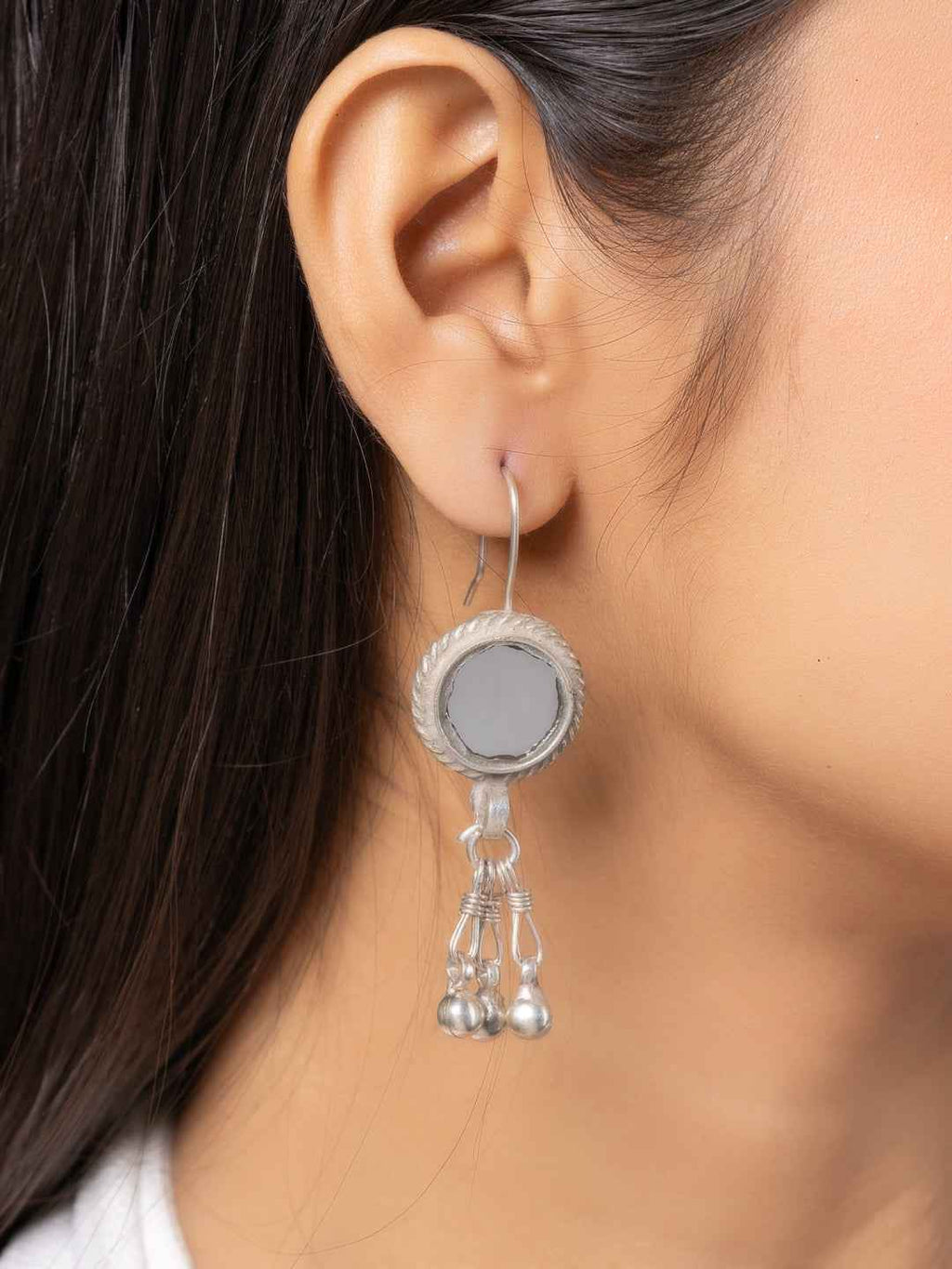 Oxidized silver Afghani earrings with a circular design and dangling filigree beads
