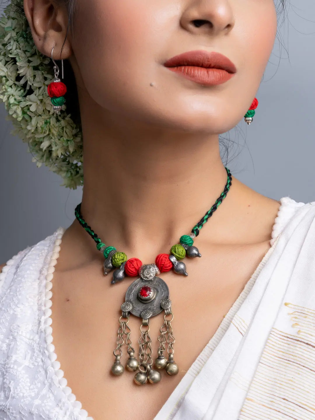 LOOK AND ADORN afghani necklace set featuring colorful beads and traditional silver pendant with dangling bells