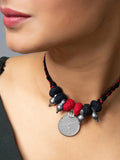 Afghani pendant necklace with red and black beads and silver coin detail from LOOK AND ADORN Afghani Jewellery