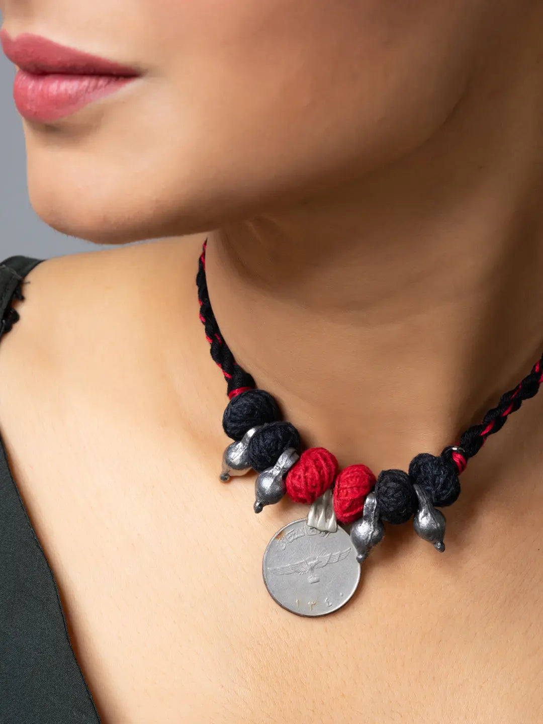 Afghani pendant necklace with red and black beads and silver coin detail from LOOK AND ADORN Afghani Jewellery