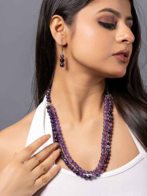 Handmade amethyst necklace set with elegant purple beads and matching earrings, perfect for any occasion