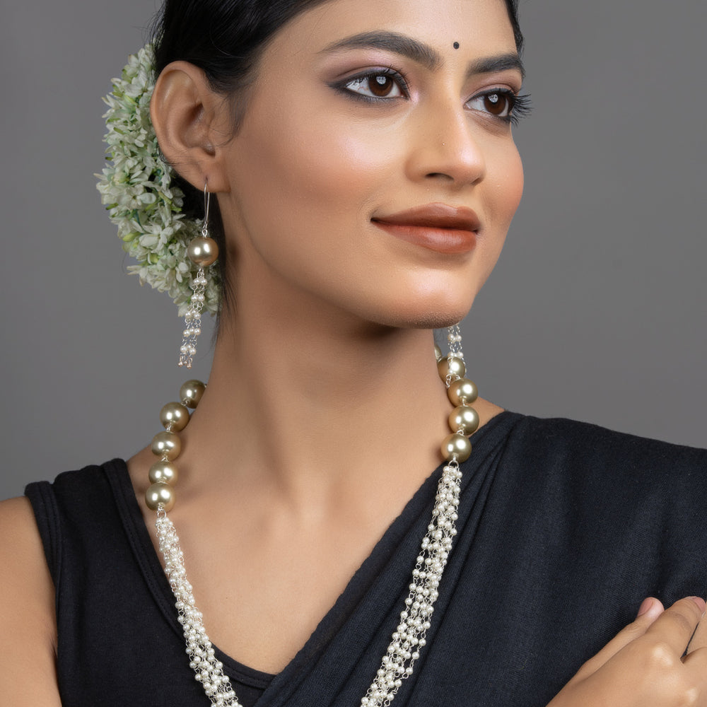 LOOK AND ADORN handmade pearl necklace set on model with layered pearls and matching long pearl earrings