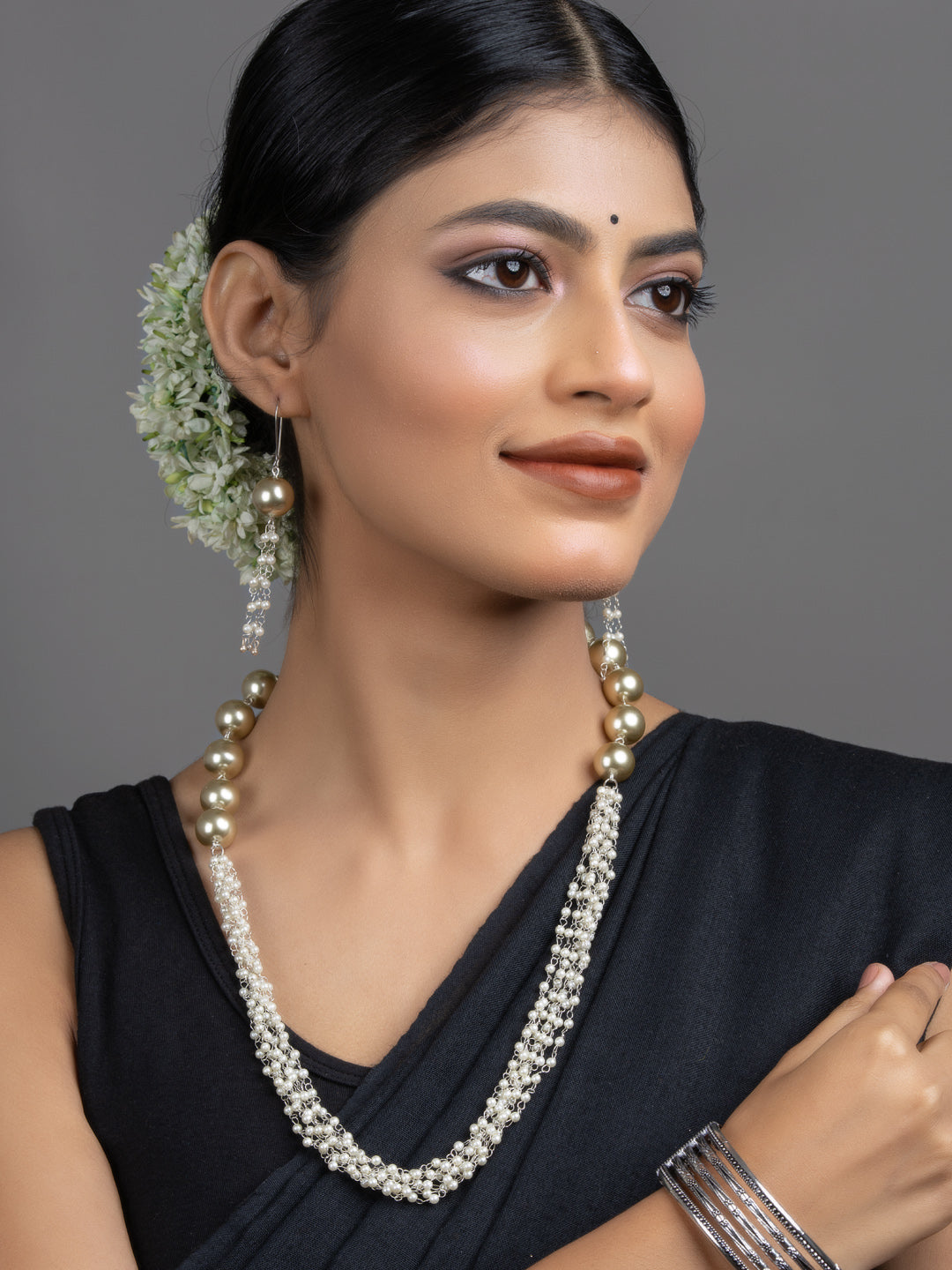 LOOK AND ADORN handmade pearl necklace set on model with layered pearls and matching long pearl earrings