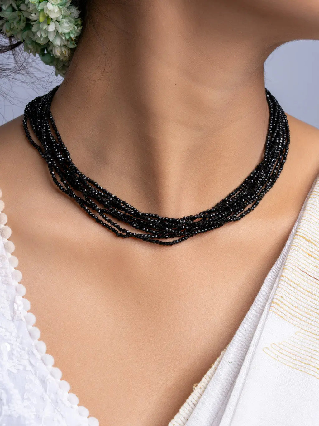 LOOK AND ADORN handmade black crystal necklace with multiple strands worn on neck