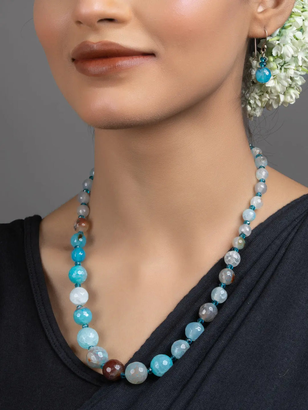 Blue Onyx Necklace Set handmade by LOOK AND ADORN on model wearing matching beaded earring