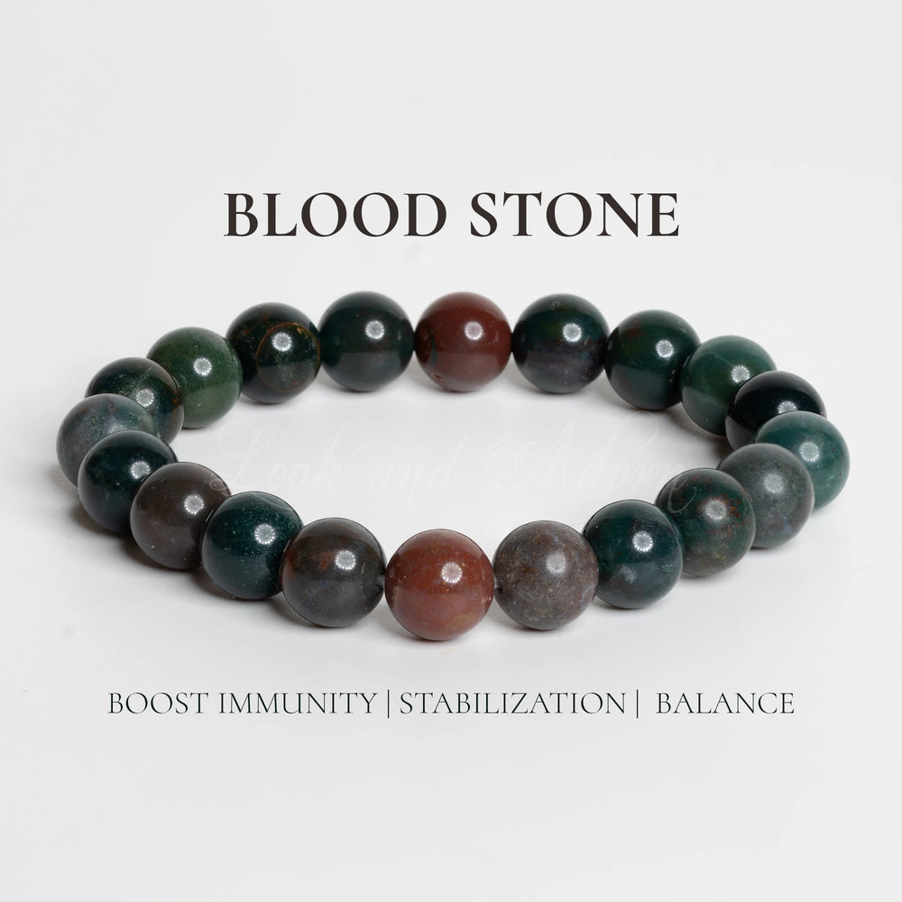 Blood stone bracelet featuring polished beads for balance and immunity support