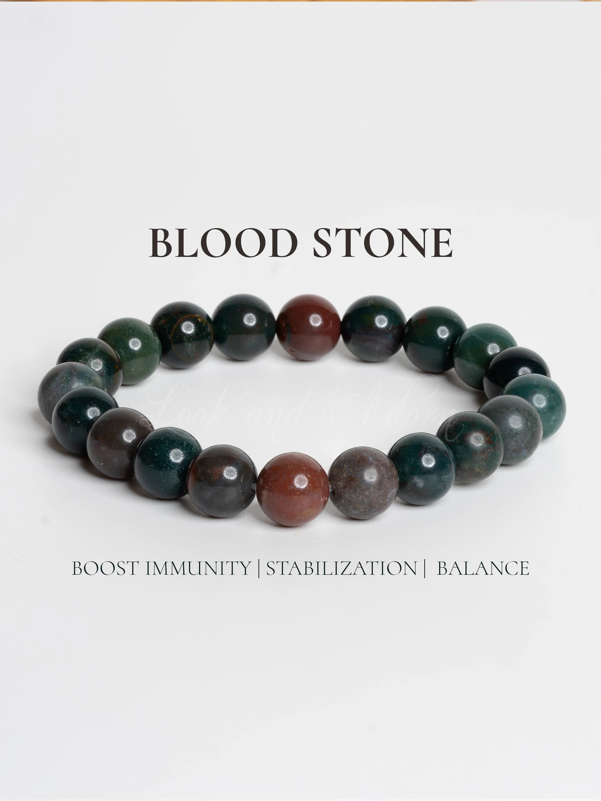 Blood stone bracelet featuring polished beads for balance and immunity support