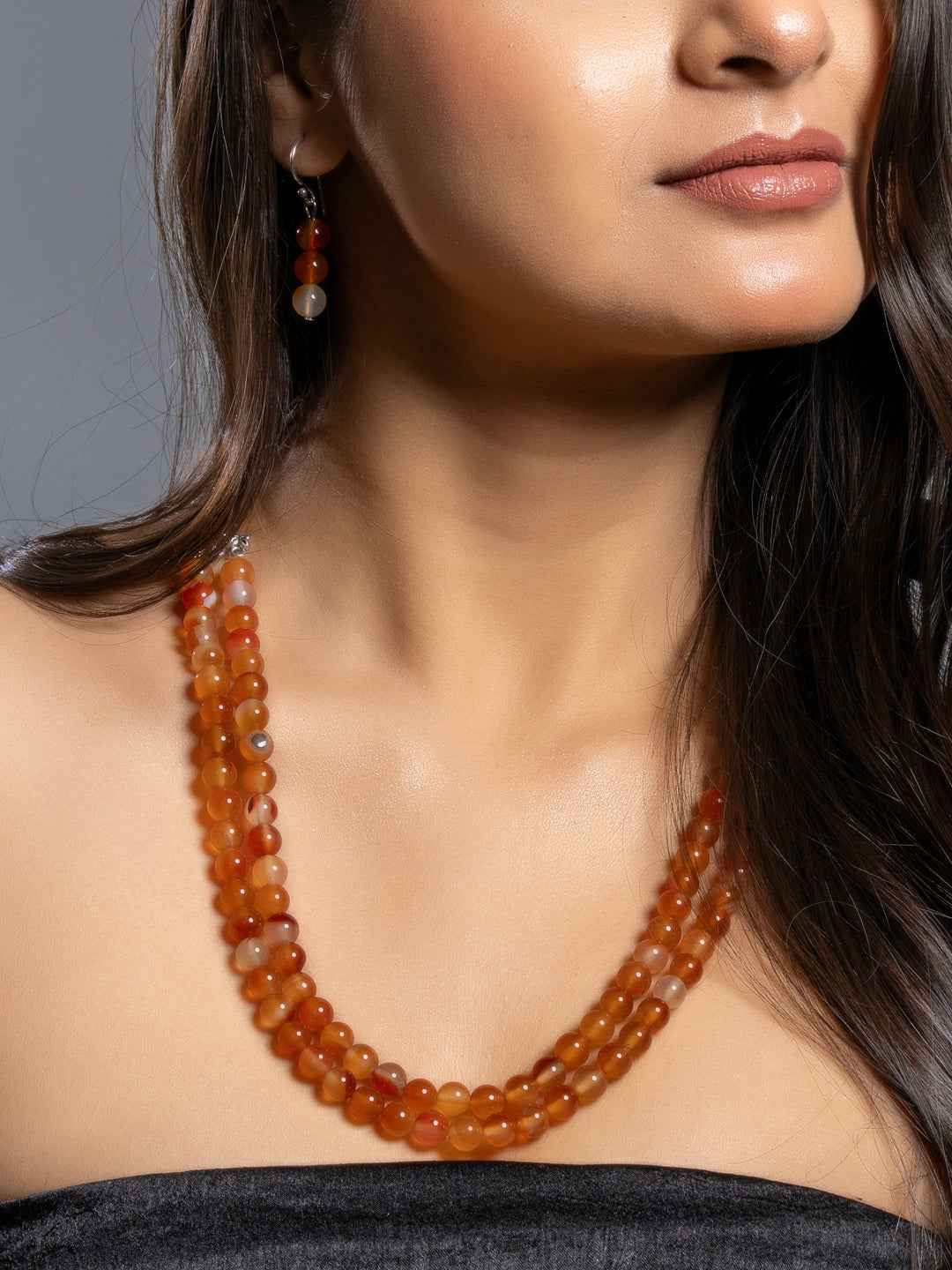 Handmade carnelian necklace set in orange hues with matching earrings for a chic look