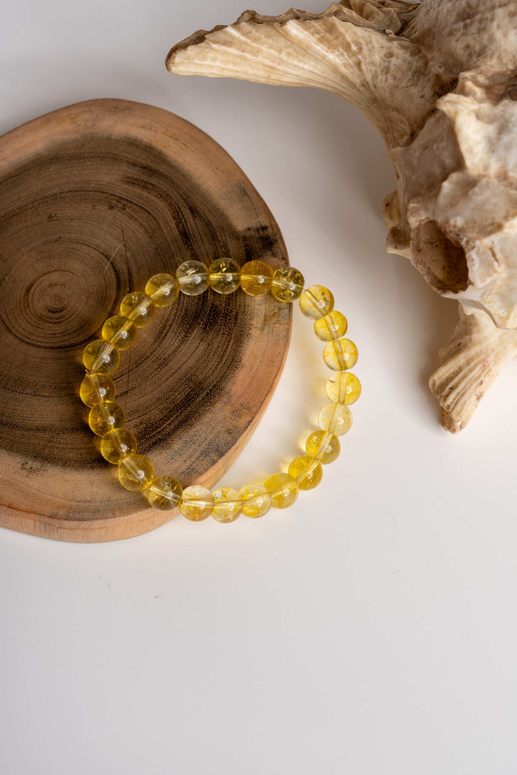Citrine bracelet from LOOK AND ADORN featuring vibrant yellow gemstones on a round design