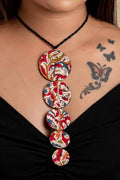 LOOK AND ADORN fabric handmade choker with colorful circular patterned pendants on black braided cord