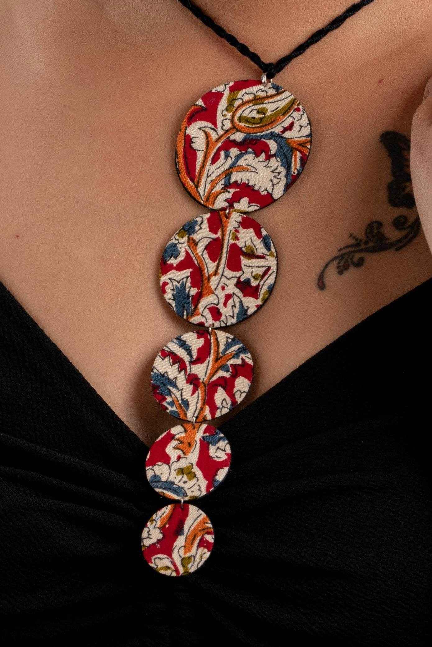 Fabric handmade choker with colorful round floral patterned pendants on black braided cord