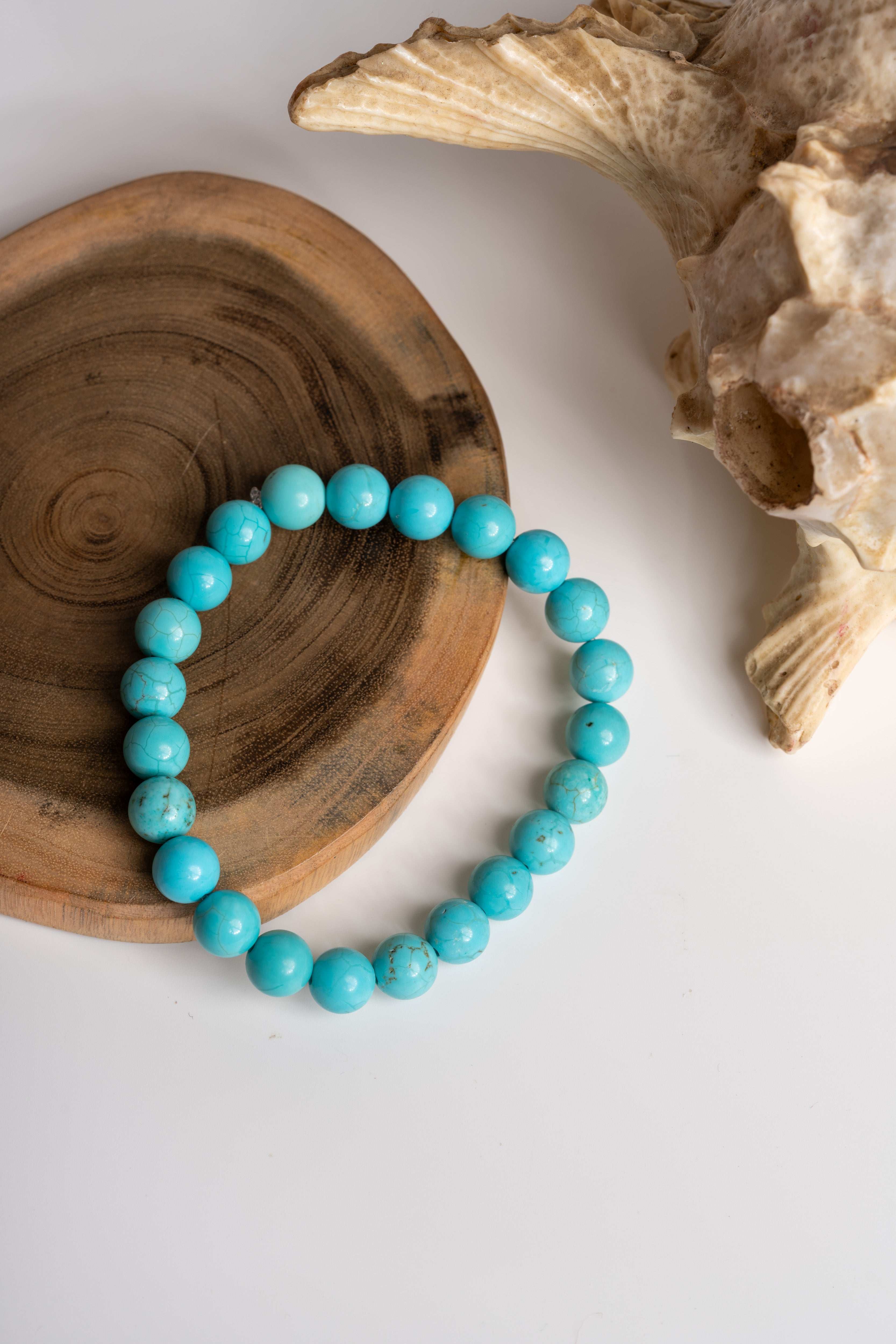 Firoza stone bracelet made with vibrant turquoise beads, perfect for stylish accessory lovers