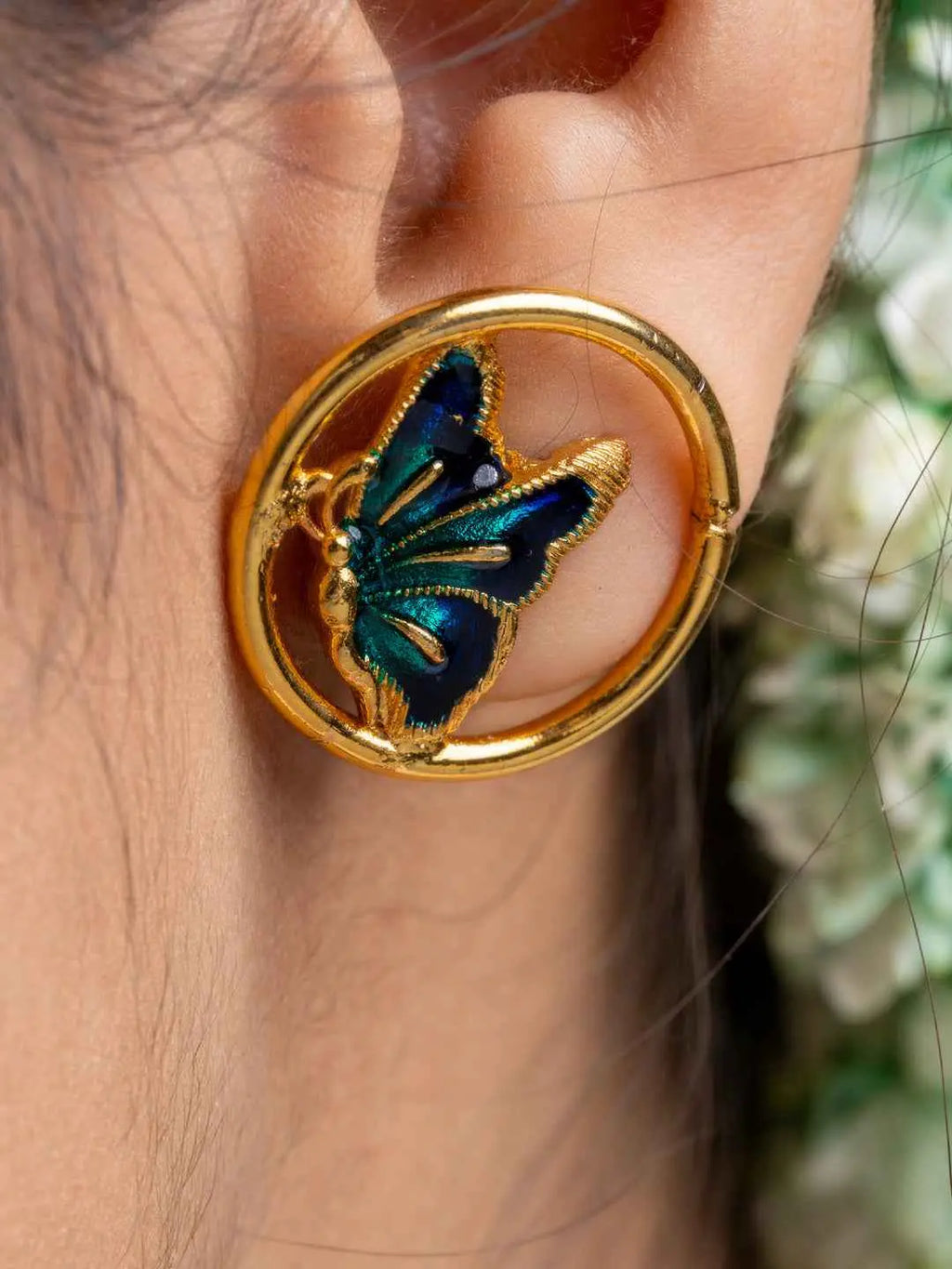LOOK AND ADORN gold plated earrings featuring a circular design with a blue and green butterfly detail
