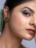 Close-up of woman wearing LOOK AND ADORN gold plated earrings with butterfly design