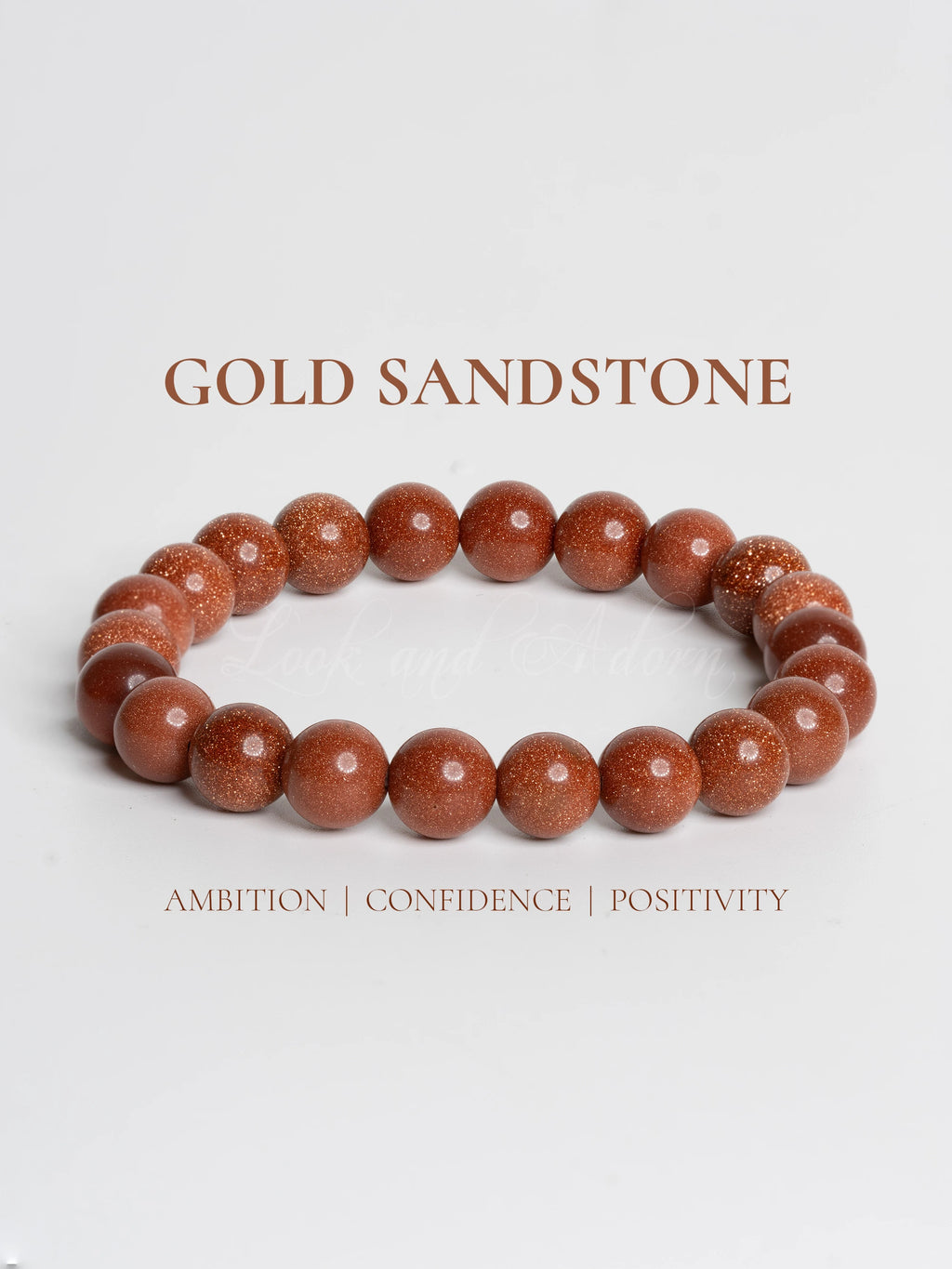 Elegant gold sandstone bracelet made with polished beads, symbolizing ambition and positivity