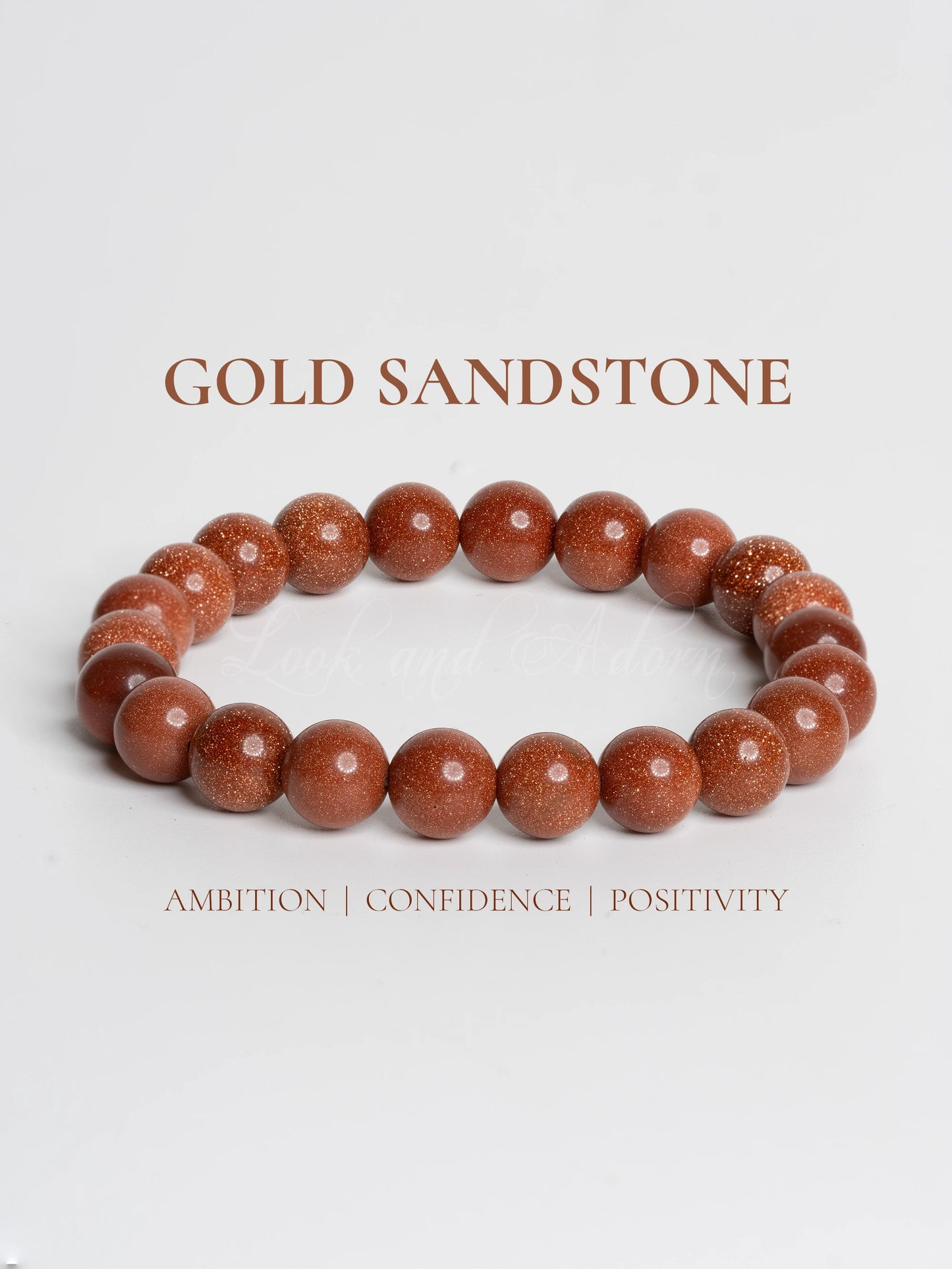 Elegant gold sandstone bracelet made with polished beads, symbolizing ambition and positivity