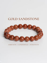 Elegant gold sandstone bracelet made with polished beads, symbolizing ambition and positivity