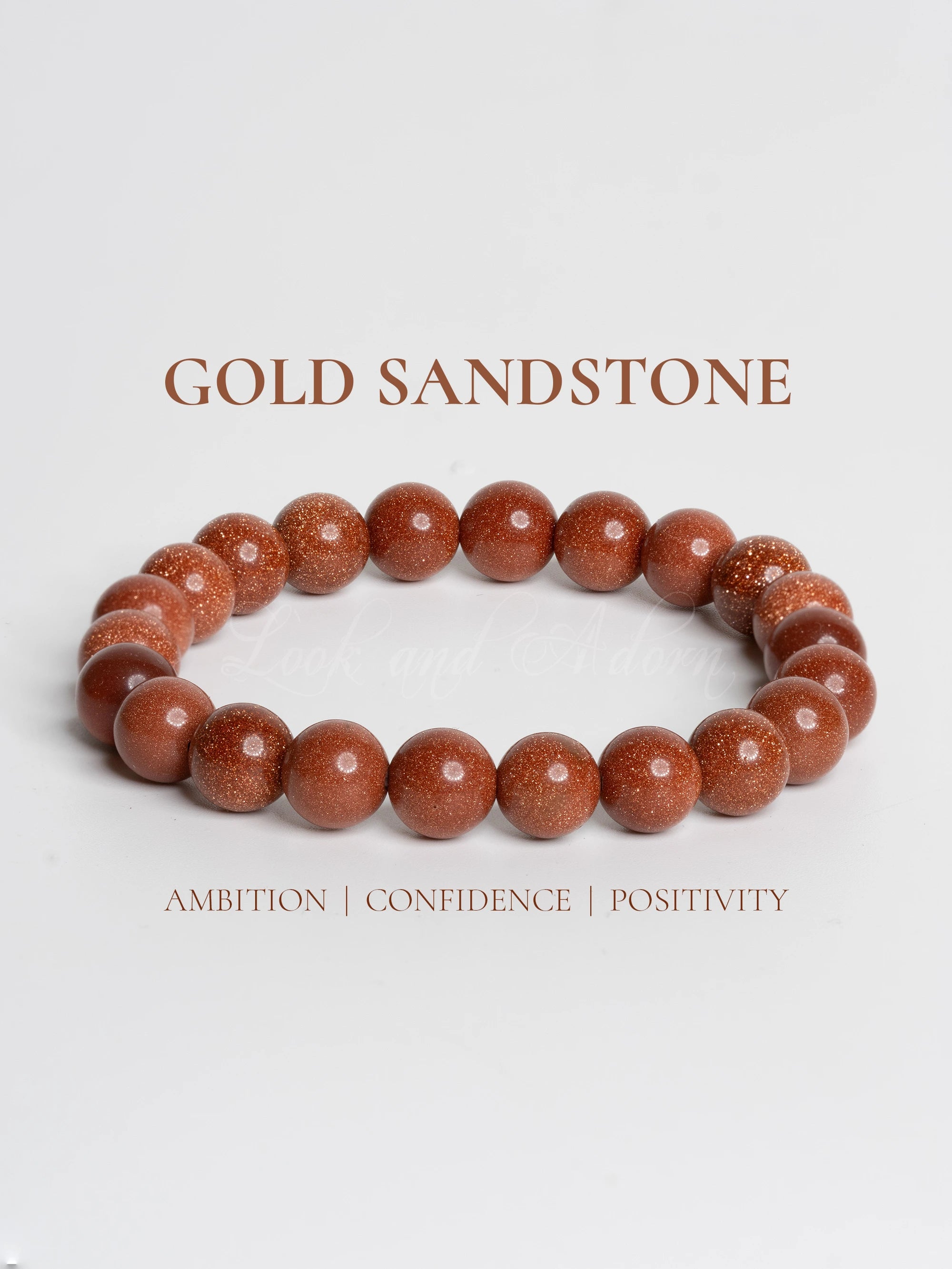 Elegant gold sandstone bracelet made with polished beads, symbolizing ambition and positivity