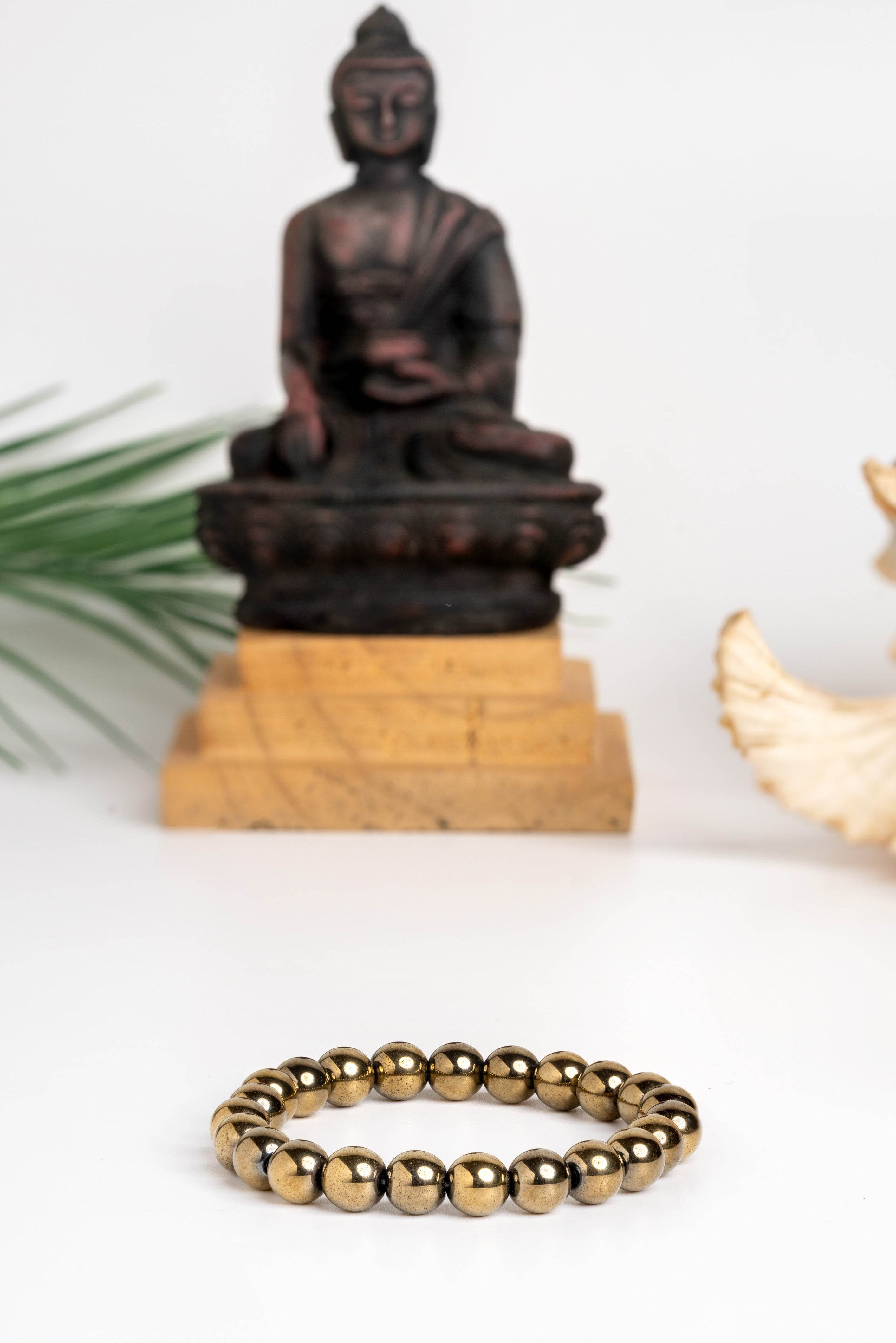 Golden Hematite Bracelet featuring smooth polished beads, perfect for stylish layering