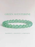 Green aventurine bracelet featuring smooth beads, promoting prosperity, creativity, and compassion.