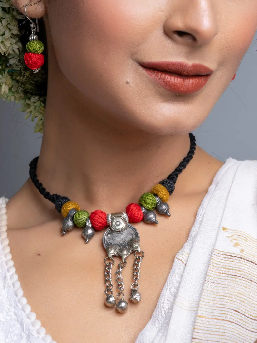 Afghani necklace set featuring colorful beads and silver pendant with chains by LOOK AND ADORN