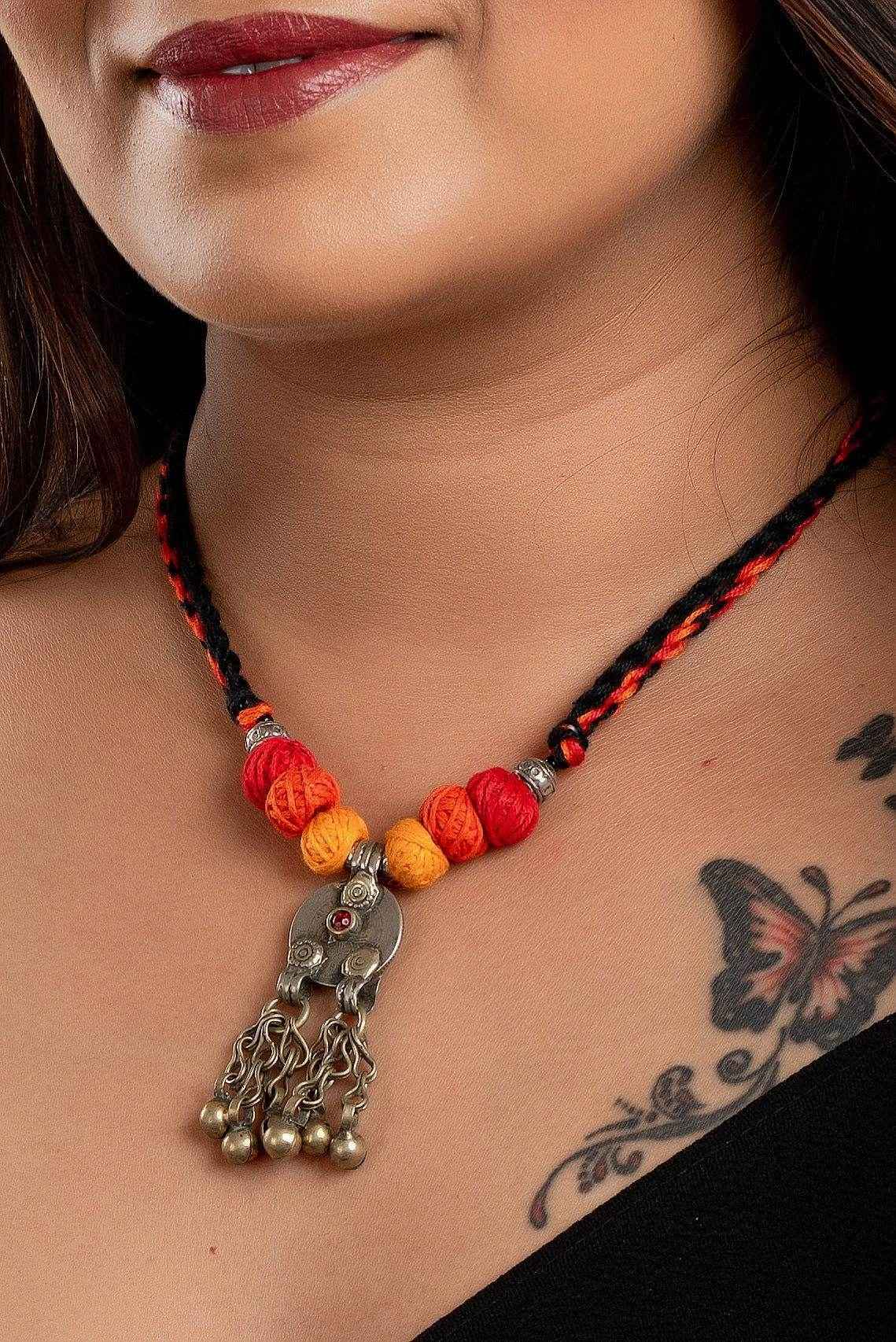 Afghan Tibetan brass oxidised silver necklace with colorful beads featuring handmade jewelry design