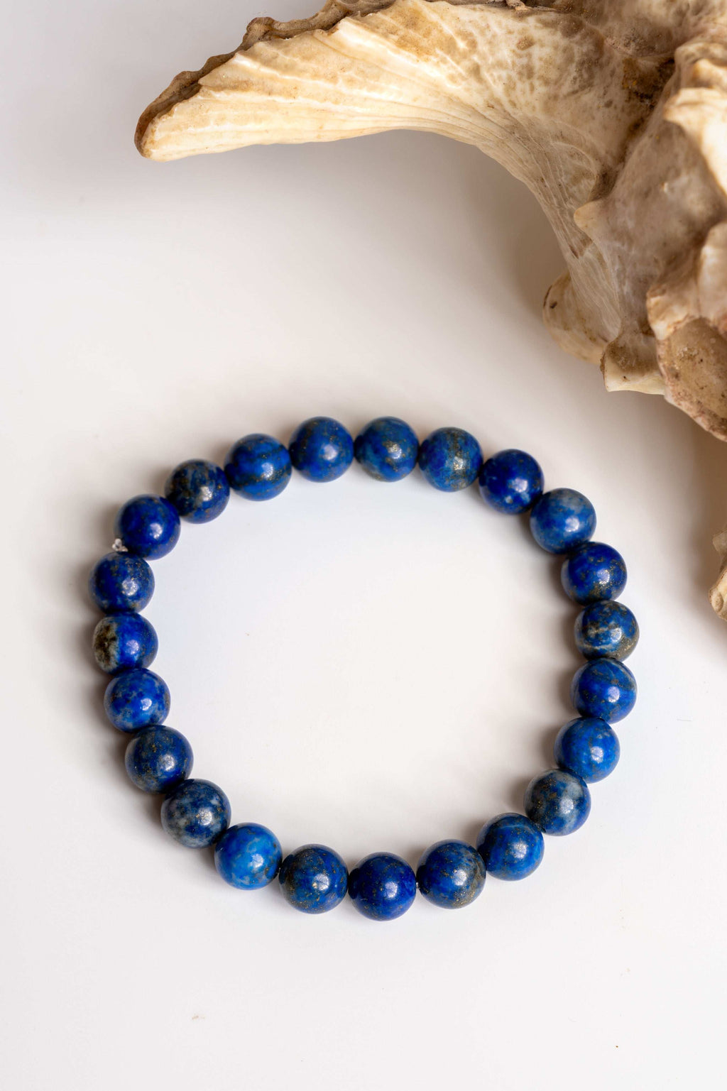 Lapis lazuli bracelet featuring deep blue stones designed by LOOK AND ADORN for stylish accessories